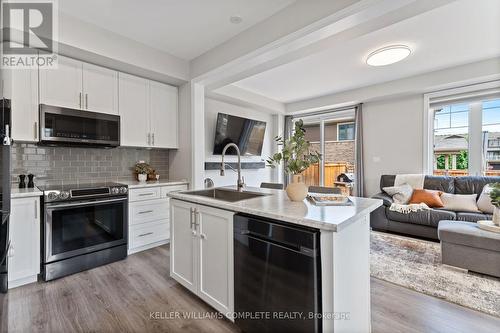 187 - 1890 Rymal Road E, Hamilton, ON - Indoor Photo Showing Kitchen