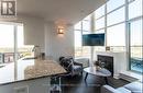 827 - 250 Manitoba Street, Toronto, ON  - Indoor Photo Showing Living Room With Fireplace 