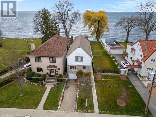 107 Lake Shore Drive, Toronto, ON - Outdoor With Body Of Water With Facade