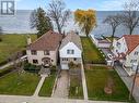 107 Lake Shore Drive, Toronto, ON  - Outdoor With Body Of Water With Facade 