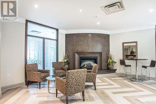 803 - 3840 Bathurst Street, Toronto, ON - Indoor Photo Showing Living Room With Fireplace