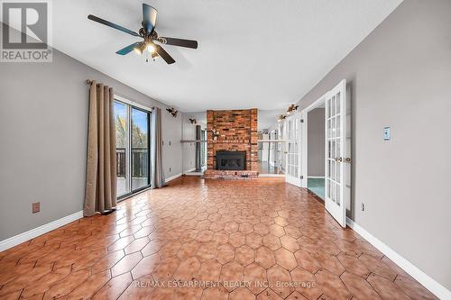 1281 Abbey Court, Burlington, ON - Indoor Photo Showing Other Room With Fireplace