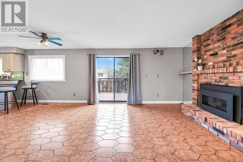 1281 Abbey Court, Burlington, ON - Indoor Photo Showing Living Room With Fireplace