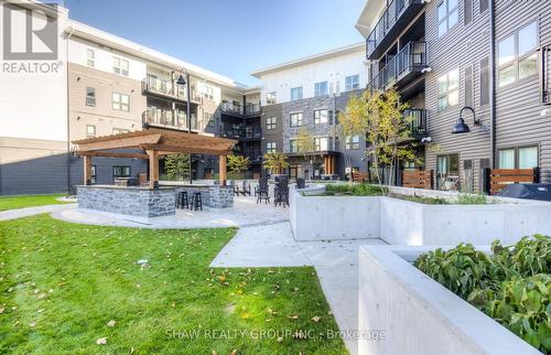 416 - 110 Fergus Avenue, Kitchener, ON - Outdoor With Facade