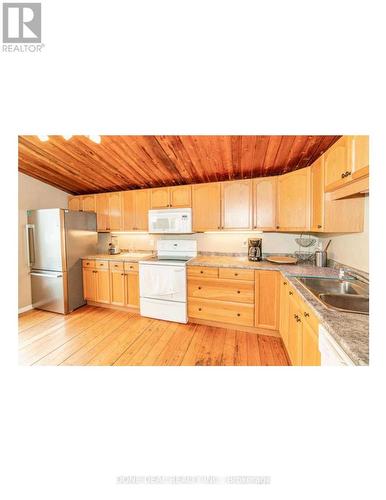 179 Chapman Drive, Magnetawan, ON - Indoor Photo Showing Kitchen With Double Sink