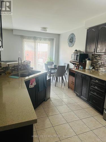 47 Madronna Gardens, Brampton, ON - Indoor Photo Showing Kitchen With Double Sink