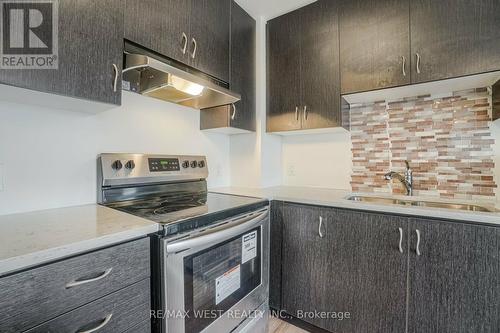 613 - 200 Lagerfeld Drive, Brampton, ON - Indoor Photo Showing Kitchen With Double Sink