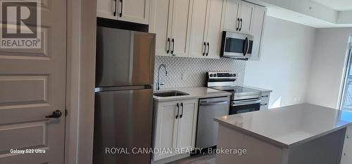 306 - 480 Gordon Krantz Avenue, Milton, ON - Indoor Photo Showing Kitchen With Stainless Steel Kitchen