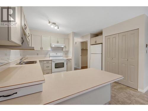 2235 Baskin Street Unit# 116, Penticton, BC - Indoor Photo Showing Kitchen With Double Sink