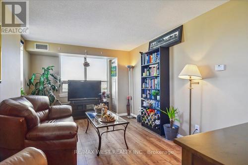 1112 - 4 Elsinore Path S, Toronto, ON - Indoor Photo Showing Living Room