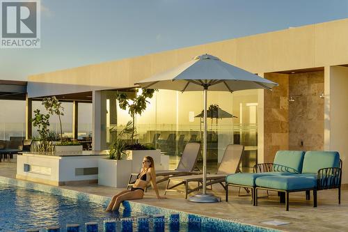 A401 - Ipana Condos, Mexico, ON -  Photo Showing Other Room With In Ground Pool