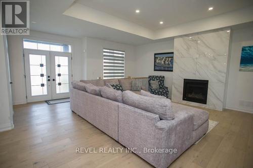 14 Bowen Place, Brant, ON - Indoor Photo Showing Living Room With Fireplace