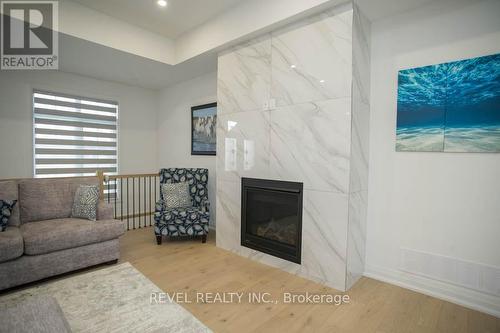 14 Bowen Place, Brant, ON - Indoor Photo Showing Living Room With Fireplace