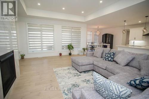 14 Bowen Place, Brant, ON - Indoor Photo Showing Living Room With Fireplace