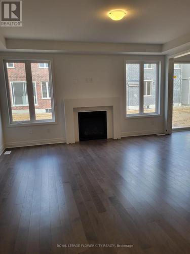 79 Milt Schmidt Street, Kitchener, ON - Indoor Photo Showing Living Room With Fireplace