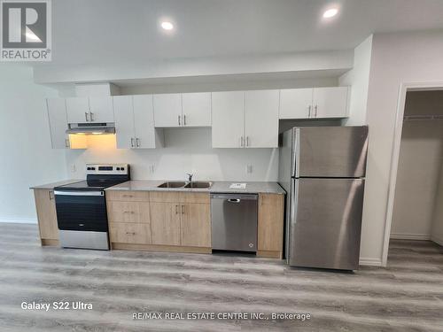 701 - 181 Elmira Road, Guelph, ON - Indoor Photo Showing Kitchen With Stainless Steel Kitchen With Double Sink