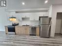 701 - 181 Elmira Road, Guelph, ON  - Indoor Photo Showing Kitchen With Stainless Steel Kitchen With Double Sink 