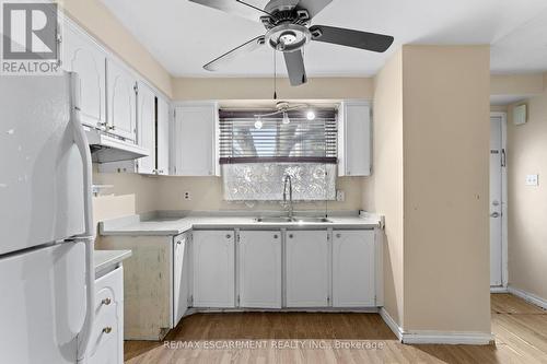 M - 25 Bryna Avenue, Hamilton, ON - Indoor Photo Showing Kitchen With Double Sink