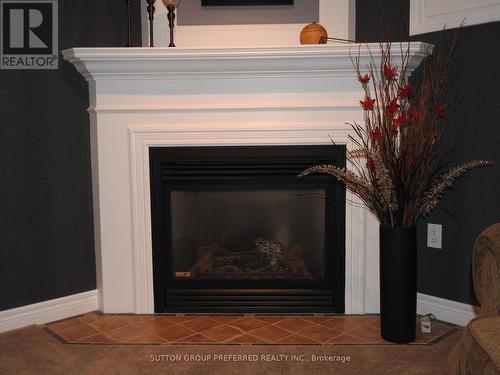 138 Eastview Avenue, Woodstock (Woodstock - North), ON - Indoor Photo Showing Living Room With Fireplace