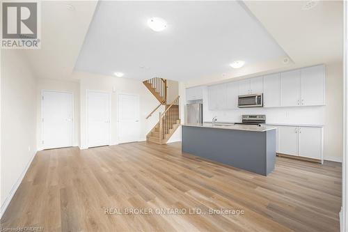 115 - 1565 Rose Way, Milton, ON - Indoor Photo Showing Kitchen