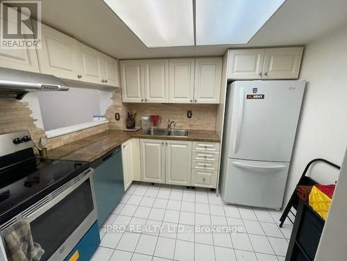 210 - 75 King Street, Mississauga, ON - Indoor Photo Showing Kitchen With Double Sink