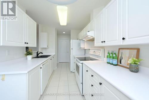 601 - 10 Dayspring Circle, Brampton, ON - Indoor Photo Showing Kitchen With Double Sink