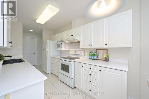 601 - 10 Dayspring Circle, Brampton, ON - Indoor Photo Showing Kitchen With Double Sink