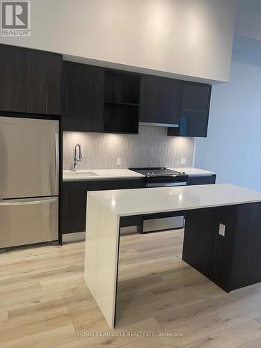 133 - 395 Dundas Street W, Oakville, ON - Indoor Photo Showing Kitchen With Upgraded Kitchen