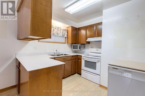 7596 Darcel Avenue, Mississauga, ON - Indoor Photo Showing Kitchen With Double Sink