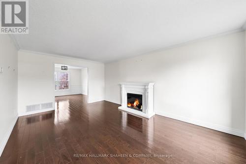 1034 Oak Meadow Road, Oakville, ON - Indoor Photo Showing Living Room With Fireplace