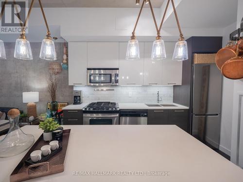 526 - 90 Broadview Avenue, Toronto, ON - Indoor Photo Showing Kitchen With Stainless Steel Kitchen With Double Sink With Upgraded Kitchen