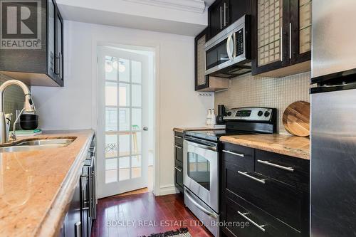 1716 Dundas Street E, Toronto, ON - Indoor Photo Showing Kitchen With Double Sink