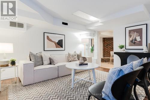 1716 Dundas Street E, Toronto, ON - Indoor Photo Showing Living Room