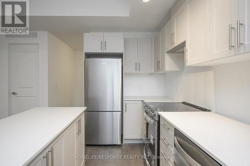 119 - 1070 Douglas Mccurdy Comm, Mississauga, ON - Indoor Photo Showing Kitchen