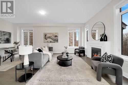 210 Ferragine Crescent, Bradford West Gwillimbury, ON - Indoor Photo Showing Living Room With Fireplace