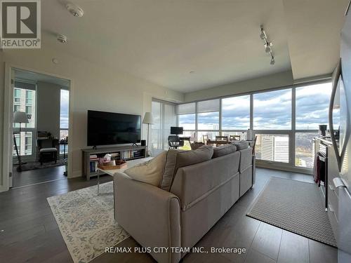 2405 - 2 Sonic Way, Toronto, ON - Indoor Photo Showing Living Room