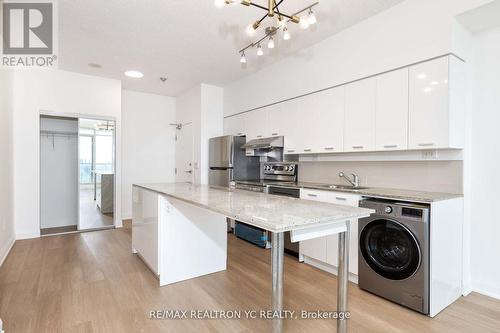 3015 - 29 Singer Court, Toronto, ON - Indoor Photo Showing Laundry Room