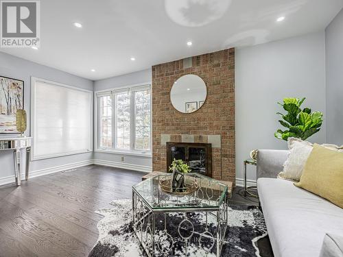 175 Port Royal Trail, Toronto, ON - Indoor Photo Showing Living Room With Fireplace