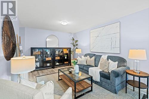 58 - 1610 Crawforth Street, Whitby, ON - Indoor Photo Showing Living Room