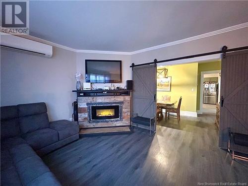 9 King Street, Campbellton, NB - Indoor Photo Showing Living Room With Fireplace