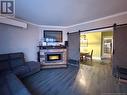 9 King Street, Campbellton, NB  - Indoor Photo Showing Living Room With Fireplace 