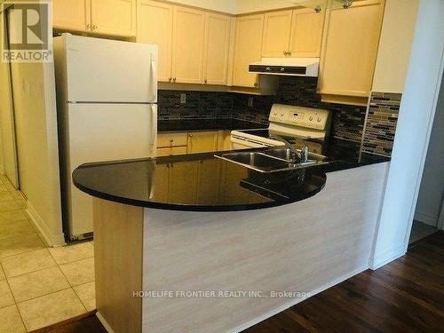 902 - 3 Rean Drive N, Toronto, ON - Indoor Photo Showing Kitchen With Double Sink