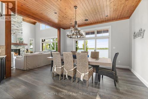 580 Indian Point Road, Kawartha Lakes, ON - Indoor Photo Showing Dining Room With Fireplace