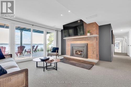 7494 Bamsey Drive, Hamilton Township, ON - Indoor Photo Showing Living Room With Fireplace