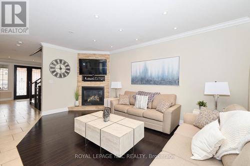 5784 Ironwood Street, Niagara Falls (219 - Forestview), ON - Indoor Photo Showing Living Room With Fireplace