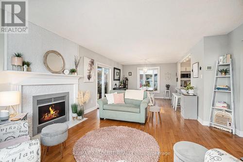 148 Charles Street, Arnprior, ON - Indoor Photo Showing Living Room With Fireplace