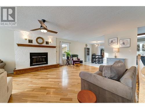 1382 Cypress Drive, Sparwood, BC - Indoor Photo Showing Living Room With Fireplace