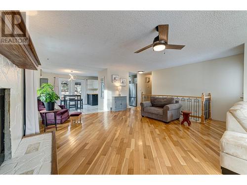 1382 Cypress Drive, Sparwood, BC - Indoor Photo Showing Living Room With Fireplace