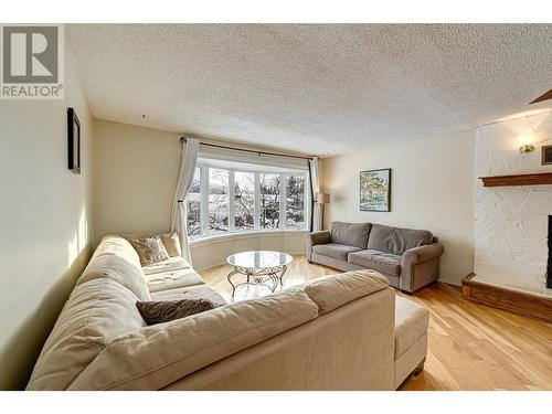 1382 Cypress Drive, Sparwood, BC - Indoor Photo Showing Living Room With Fireplace