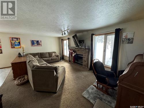 Acreage Near White Cap, Lomond Rm No. 37, SK - Indoor Photo Showing Living Room With Fireplace